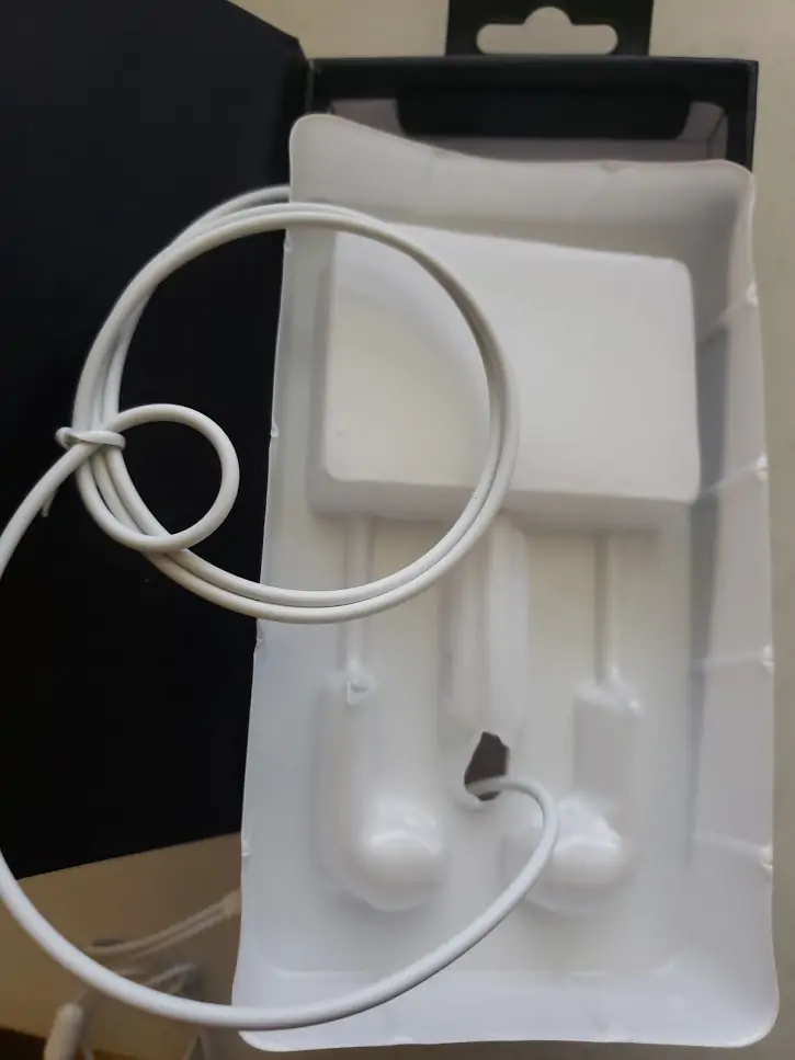 The earbuds cable inside the box