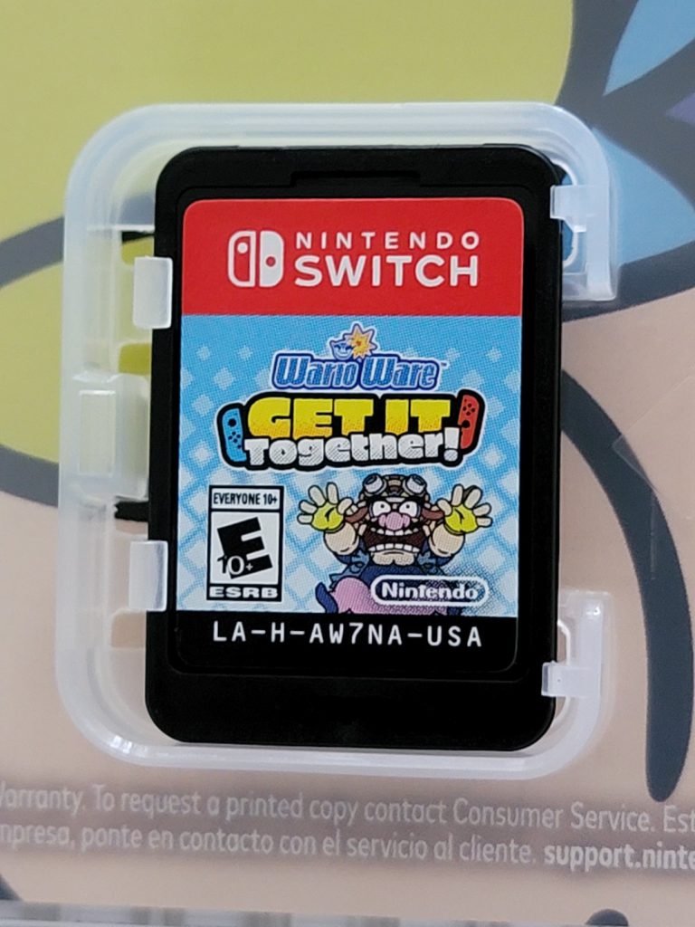 Game Cartridge of the Nintendo Switch game Wario Ware: Get It Together inside the case