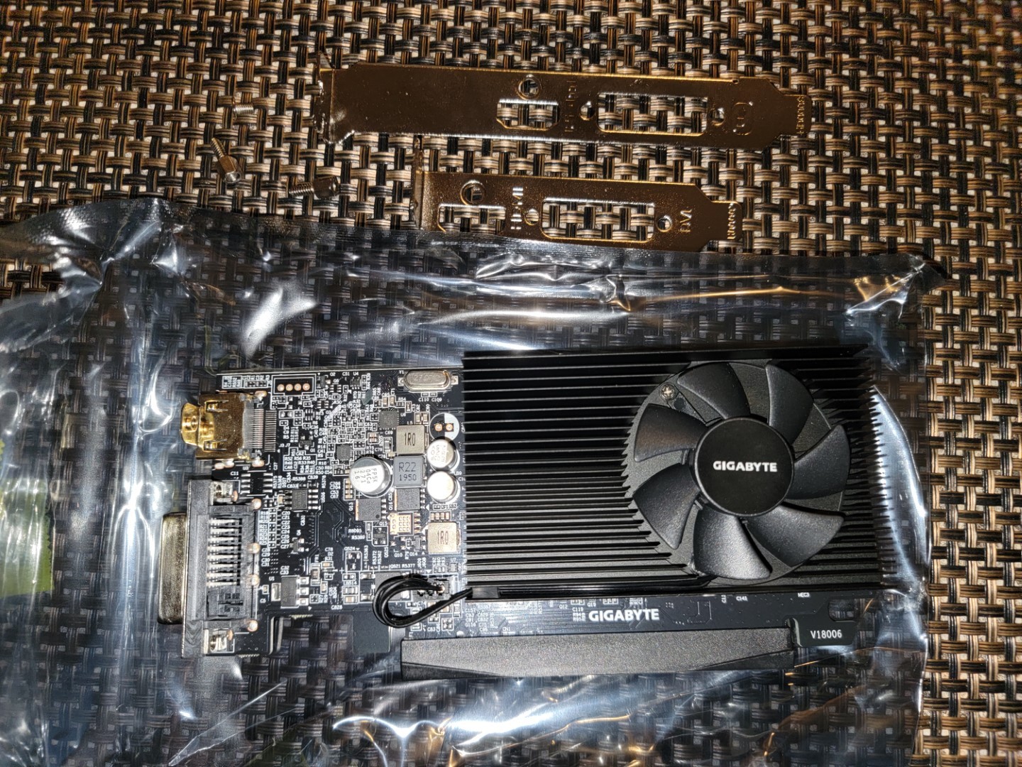 Gigabyte GV-N1030D4-2GL Nvidia Geforce GT 1030 Low Profile D4 2G DDR4 2GB Graphics Card - GPU with bracket removed.