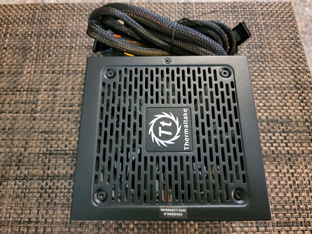 Thermaltake Toughpower GX2 600W PSU showing internals.