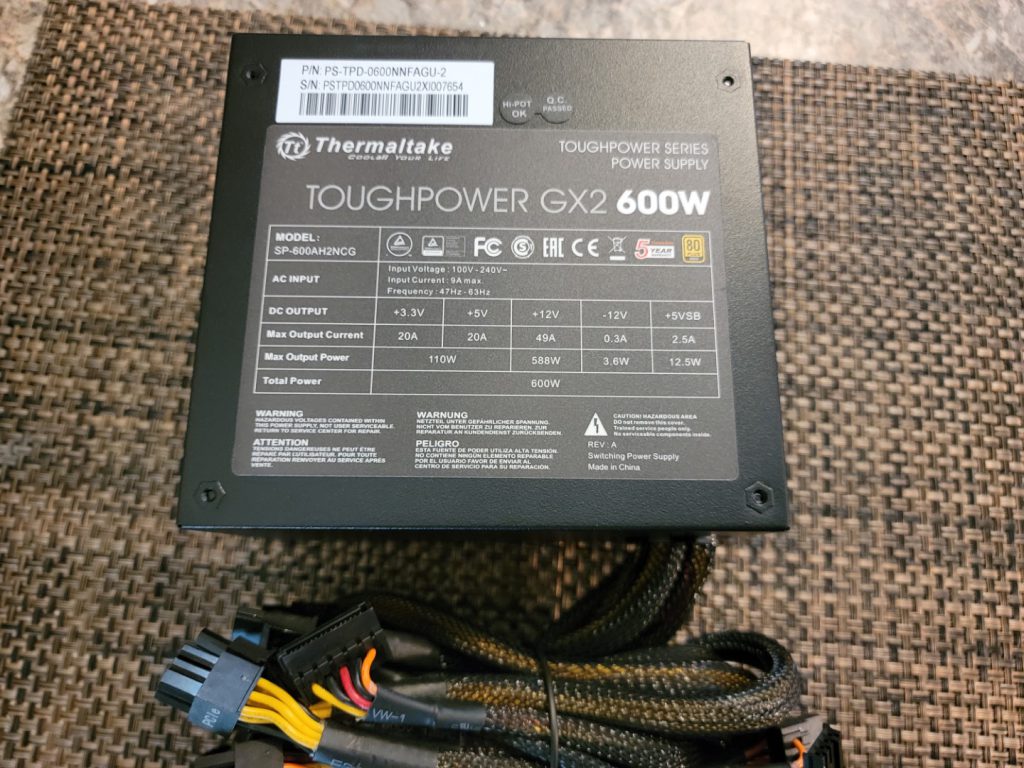 Thermaltake Toughpower GX2 600W PSU Showing details.