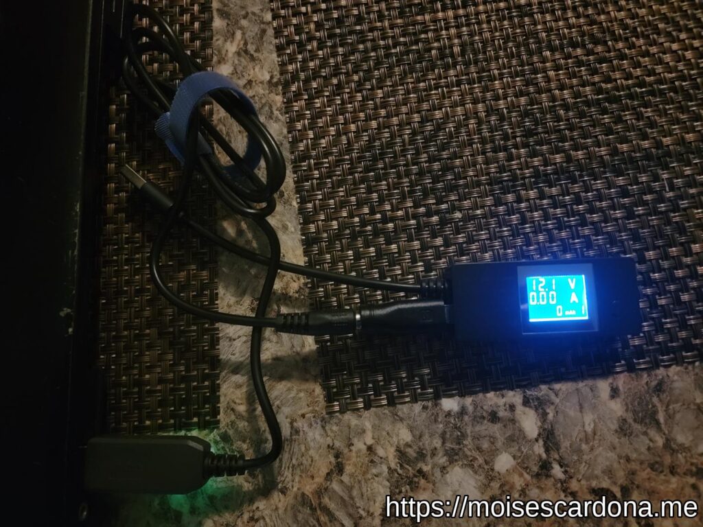 Farsense USB 5V to 12V DC Step Up cable connected to USB meter