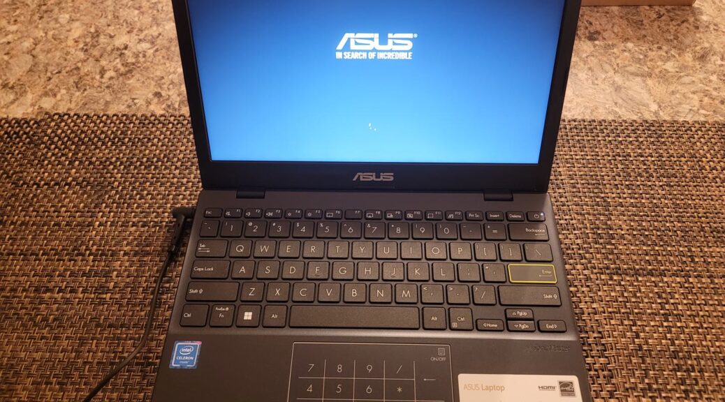 ASUS E210MA 11.6 inch laptop - 20 - Laptop Powered On